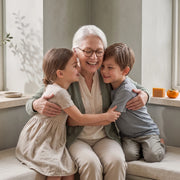 A grandmother hugged by her grandchildren
