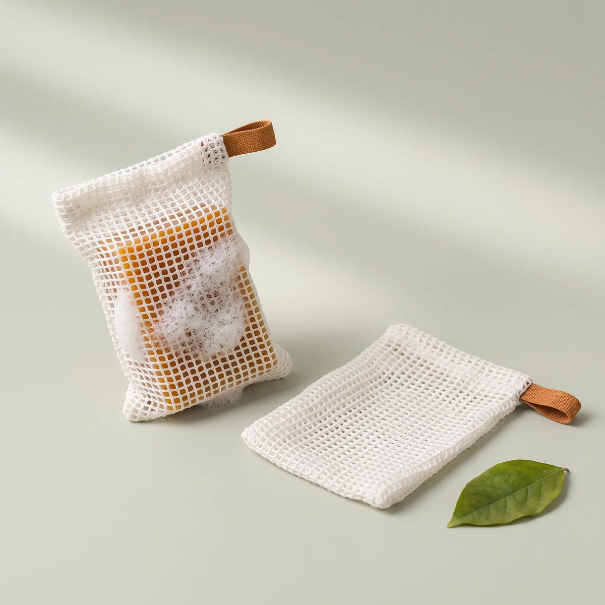 Mesh soap saver bag with the bar inside